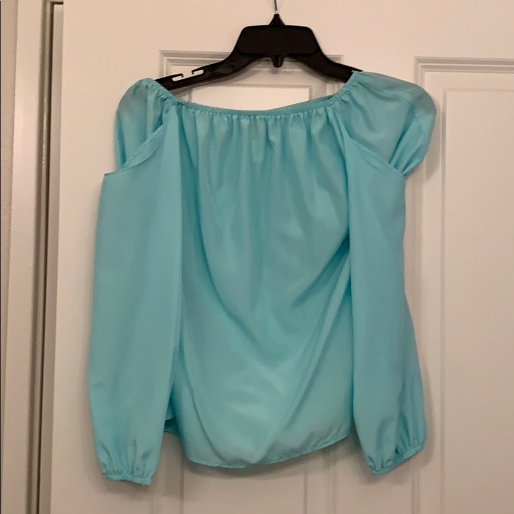 Sleeveless top with long sleeve cold shoulder